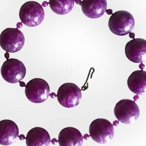 Purple cosmic swirl gumball-shaped plastic beaded necklace